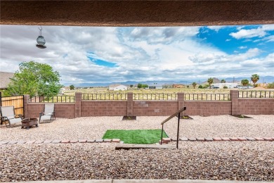 CLEAN HOME WITH STUNNING VIEWS, AND SITTING ON ( .40 ) OF AN on Valle Vista Golf Course in Arizona - for sale on GolfHomes.com, golf home, golf lot