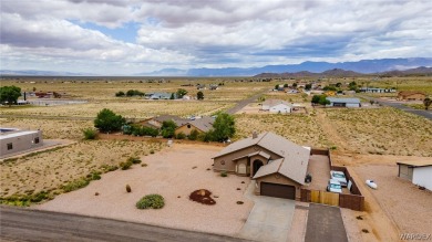 CLEAN HOME WITH STUNNING VIEWS, AND SITTING ON ( .40 ) OF AN on Valle Vista Golf Course in Arizona - for sale on GolfHomes.com, golf home, golf lot