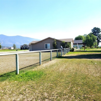 Enjoy this nice single level home situated on 1.21 level acres on The King Ranch Golf Course in Montana - for sale on GolfHomes.com, golf home, golf lot