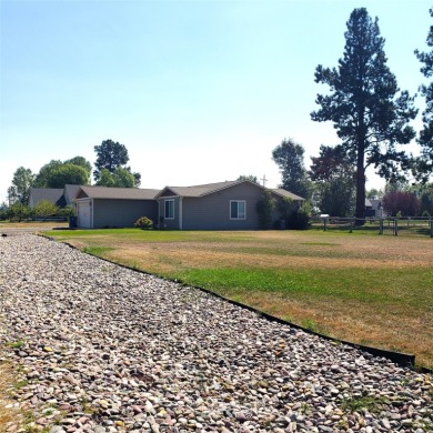 Enjoy this nice single level home situated on 1.21 level acres on The King Ranch Golf Course in Montana - for sale on GolfHomes.com, golf home, golf lot