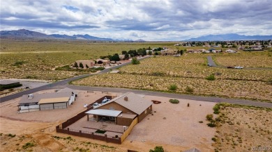 CLEAN HOME WITH STUNNING VIEWS, AND SITTING ON ( .40 ) OF AN on Valle Vista Golf Course in Arizona - for sale on GolfHomes.com, golf home, golf lot