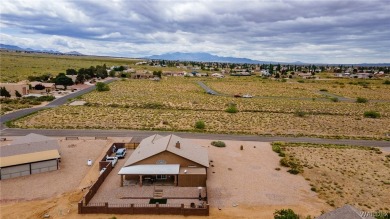 CLEAN HOME WITH STUNNING VIEWS, AND SITTING ON ( .40 ) OF AN on Valle Vista Golf Course in Arizona - for sale on GolfHomes.com, golf home, golf lot