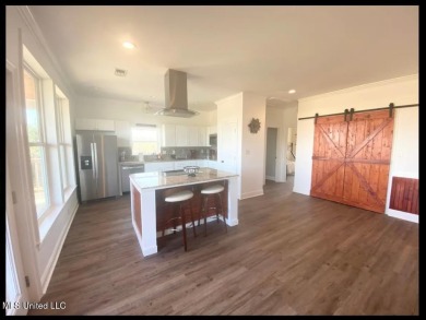 PRICE REDUCED! Just 100 yards from the picturesque Jourdan River on The Bridges Golf Club At Hollywood Casino in Mississippi - for sale on GolfHomes.com, golf home, golf lot