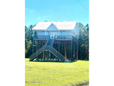 PRICE REDUCED! Just 100 yards from the picturesque Jourdan River on The Bridges Golf Club At Hollywood Casino in Mississippi - for sale on GolfHomes.com, golf home, golf lot