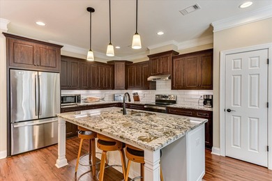 Welcome Home to the Tea Olive - Nestled on a private lot in the on Monticello Golf Club At Savannah Lakes in South Carolina - for sale on GolfHomes.com, golf home, golf lot