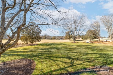 Ideally positioned within The Peninsula, this well-maintained on The Peninsula Club in North Carolina - for sale on GolfHomes.com, golf home, golf lot