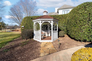 Ideally positioned within The Peninsula, this well-maintained on The Peninsula Club in North Carolina - for sale on GolfHomes.com, golf home, golf lot