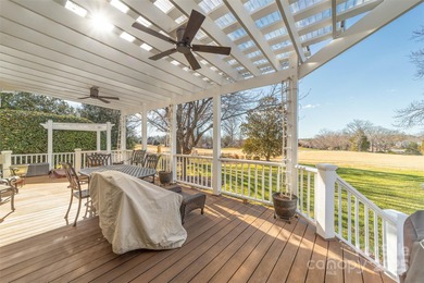 Ideally positioned within The Peninsula, this well-maintained on The Peninsula Club in North Carolina - for sale on GolfHomes.com, golf home, golf lot