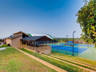 Charming and completely refreshed, this single story-and-a-half on The Shores Country Club in Texas - for sale on GolfHomes.com, golf home, golf lot
