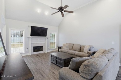 Beautiful home located in a desirable golf course community and on Bay Pointe Golf and Resort in Mississippi - for sale on GolfHomes.com, golf home, golf lot