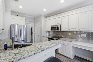 Beautiful home located in a desirable golf course community and on Bay Pointe Golf and Resort in Mississippi - for sale on GolfHomes.com, golf home, golf lot