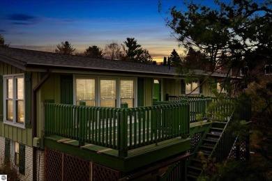 Located just within the city limits, this home offers character on Traverse City Golf and Country Club in Michigan - for sale on GolfHomes.com, golf home, golf lot