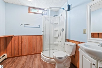 Located just within the city limits, this home offers character on Traverse City Golf and Country Club in Michigan - for sale on GolfHomes.com, golf home, golf lot