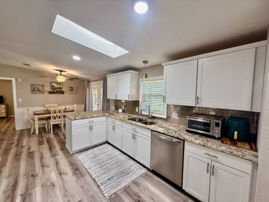 Home is located in Water Oak Country Club Estates, an active 55 on Water Oak Country Club Estates in Florida - for sale on GolfHomes.com, golf home, golf lot