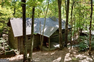 This is a light and bright, fully renovated, real log cabin in on Big Canoe Golf Club - Cherokee in Georgia - for sale on GolfHomes.com, golf home, golf lot