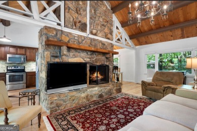 This is a light and bright, fully renovated, real log cabin in on Big Canoe Golf Club - Cherokee in Georgia - for sale on GolfHomes.com, golf home, golf lot