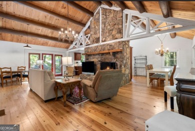 This is a light and bright, fully renovated, real log cabin in on Big Canoe Golf Club - Cherokee in Georgia - for sale on GolfHomes.com, golf home, golf lot