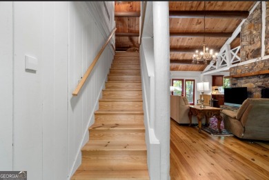 This is a light and bright, fully renovated, real log cabin in on Big Canoe Golf Club - Cherokee in Georgia - for sale on GolfHomes.com, golf home, golf lot