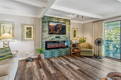 The location at Water's Edge everyone wants. A walk in unit with on Seasons Ridge At Four Seasons in Missouri - for sale on GolfHomes.com, golf home, golf lot