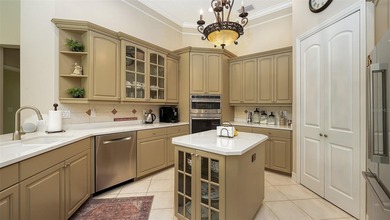 Set on more than half an acre with peaceful lake views, this on Laurel Oak Country Club in Florida - for sale on GolfHomes.com, golf home, golf lot