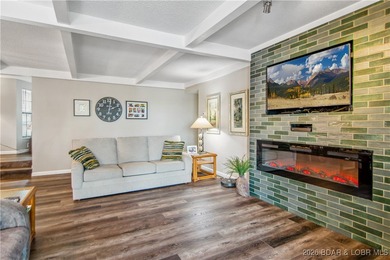 The location at Water's Edge everyone wants. A walk in unit with on Seasons Ridge At Four Seasons in Missouri - for sale on GolfHomes.com, golf home, golf lot