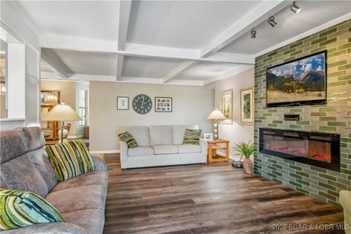 The location at Water's Edge everyone wants. A walk in unit with on Seasons Ridge At Four Seasons in Missouri - for sale on GolfHomes.com, golf home, golf lot