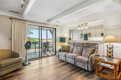 The location at Water's Edge everyone wants. A walk in unit with on Seasons Ridge At Four Seasons in Missouri - for sale on GolfHomes.com, golf home, golf lot