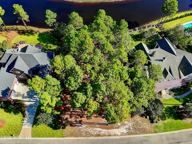 Discover a rare opportunity to own one of the few remaining pond on Members Club At St. James Plantation in North Carolina - for sale on GolfHomes.com, golf home, golf lot
