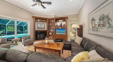 Set on more than half an acre with peaceful lake views, this on Laurel Oak Country Club in Florida - for sale on GolfHomes.com, golf home, golf lot