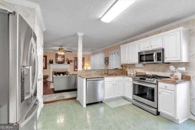 Welcome to 3573 WILLOW TREE TRACE, a beautifully maintained on Sugar Creek Golf Course in Georgia - for sale on GolfHomes.com, golf home, golf lot