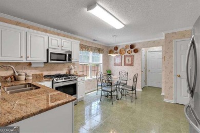 Welcome to 3573 WILLOW TREE TRACE, a beautifully maintained on Sugar Creek Golf Course in Georgia - for sale on GolfHomes.com, golf home, golf lot