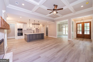 Nestled on 2.22 acres, this exquisite new construction two-story on Perry Country Club in Georgia - for sale on GolfHomes.com, golf home, golf lot