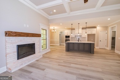 Nestled on 2.22 acres, this exquisite new construction two-story on Perry Country Club in Georgia - for sale on GolfHomes.com, golf home, golf lot