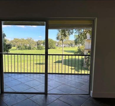 Welcome to your serene sanctuary in the gated community of on Inverrary Country Club in Florida - for sale on GolfHomes.com, golf home, golf lot