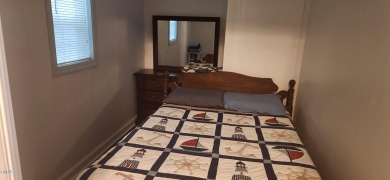 OWNER FINANCING AVAILABLE !!!  This two bedroom, one bath on River Golf and County Club at Lake Royale in North Carolina - for sale on GolfHomes.com, golf home, golf lot