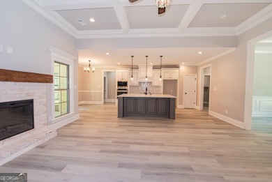 Nestled on 2.22 acres, this exquisite new construction two-story on Perry Country Club in Georgia - for sale on GolfHomes.com, golf home, golf lot