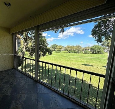 Welcome to your serene sanctuary in the gated community of on Inverrary Country Club in Florida - for sale on GolfHomes.com, golf home, golf lot