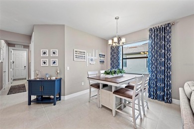 Beautiful Cascadia Villa for Sale! This stunning villa has been on Sarasota National Golf Club in Florida - for sale on GolfHomes.com, golf home, golf lot