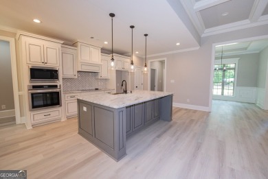 Nestled on 2.22 acres, this exquisite new construction two-story on Perry Country Club in Georgia - for sale on GolfHomes.com, golf home, golf lot