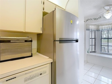 Are you looking for a quite and cozy 55 Plus Villa with low HOA on Meadow Oaks Golf and Country Club in Florida - for sale on GolfHomes.com, golf home, golf lot