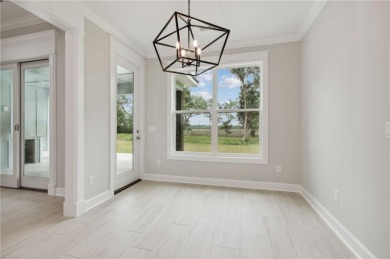 Quality construction with expansive marsh views! Finished in on The Golf Club At Sanctuary Cove in Georgia - for sale on GolfHomes.com, golf home, golf lot