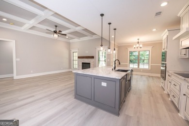 Nestled on 2.22 acres, this exquisite new construction two-story on Perry Country Club in Georgia - for sale on GolfHomes.com, golf home, golf lot