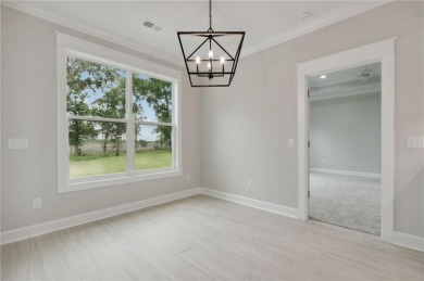 Quality construction with expansive marsh views! Finished in on The Golf Club At Sanctuary Cove in Georgia - for sale on GolfHomes.com, golf home, golf lot