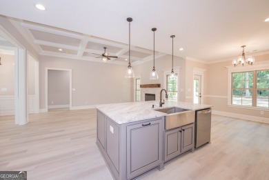 Nestled on 2.22 acres, this exquisite new construction two-story on Perry Country Club in Georgia - for sale on GolfHomes.com, golf home, golf lot