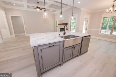 Nestled on 2.22 acres, this exquisite new construction two-story on Perry Country Club in Georgia - for sale on GolfHomes.com, golf home, golf lot