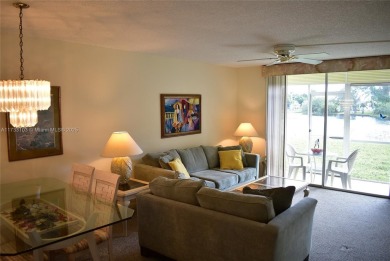 FIRST FLOOR CORNER unit within walking distance to the main on Sunrise Lakes Phase III in Florida - for sale on GolfHomes.com, golf home, golf lot