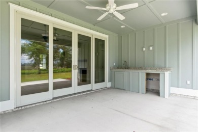 Quality construction with expansive marsh views! Finished in on The Golf Club At Sanctuary Cove in Georgia - for sale on GolfHomes.com, golf home, golf lot