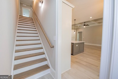 Nestled on 2.22 acres, this exquisite new construction two-story on Perry Country Club in Georgia - for sale on GolfHomes.com, golf home, golf lot
