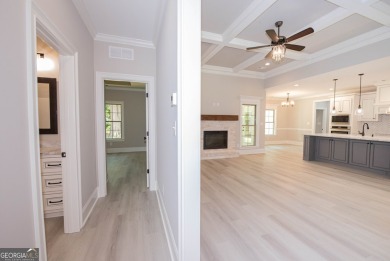 Nestled on 2.22 acres, this exquisite new construction two-story on Perry Country Club in Georgia - for sale on GolfHomes.com, golf home, golf lot