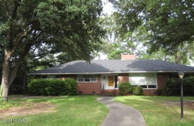 Offer has been accepted by seller 3/20/24** Brick home on corner on Kinston Country Club Inc in North Carolina - for sale on GolfHomes.com, golf home, golf lot